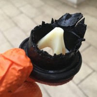 plumber fixing a leaking pipe
