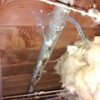 plumbing contractor finds leaking pipe