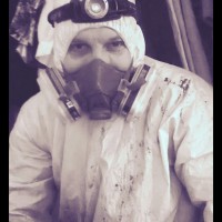 plumber suited up for the job at hand